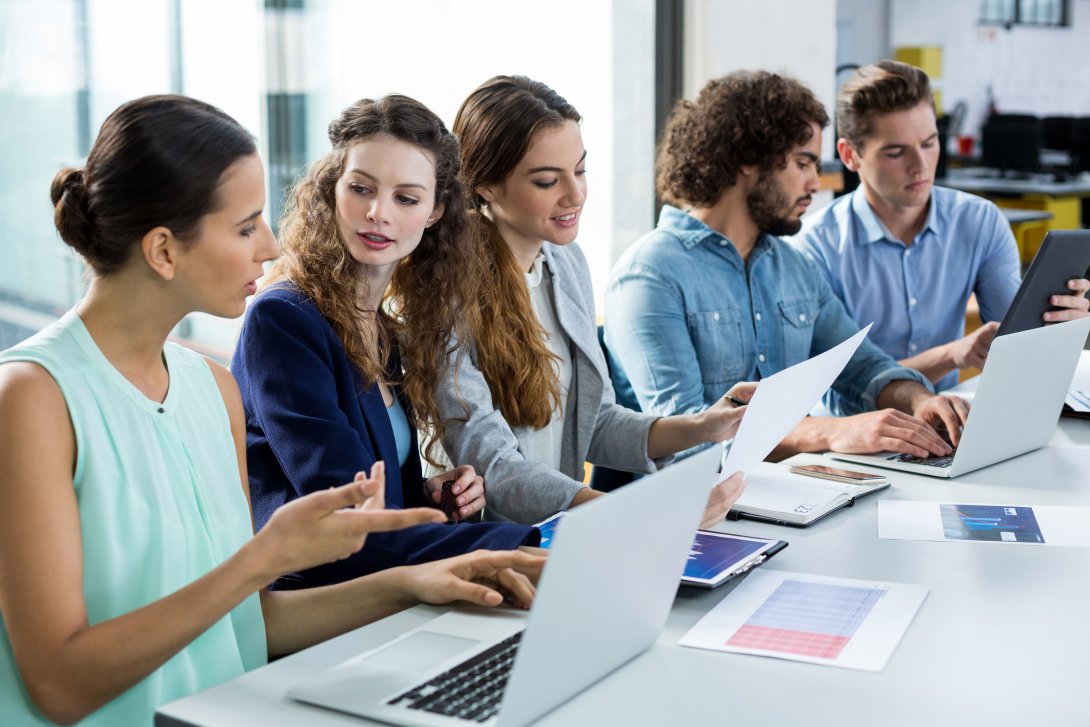 Picture of students working at their laptops